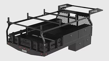 Black utility truck bed with storage compartments, ladder rack, and side netting, set against a plain background.