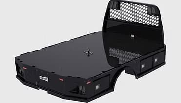 Black flatbed truck with storage compartments and a head rack.