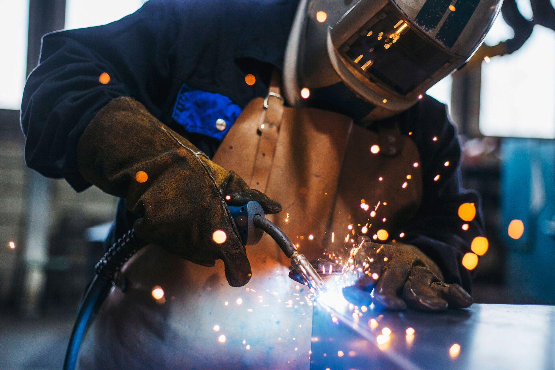 Welder With Torch – Stevens Point, WI – Central Wisconsin Mobile Welding & Fabrication