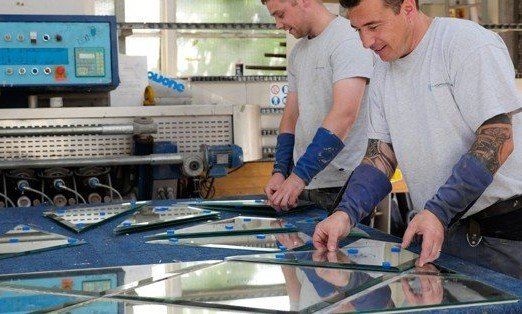 Jordans workers cutting bespoke glass.