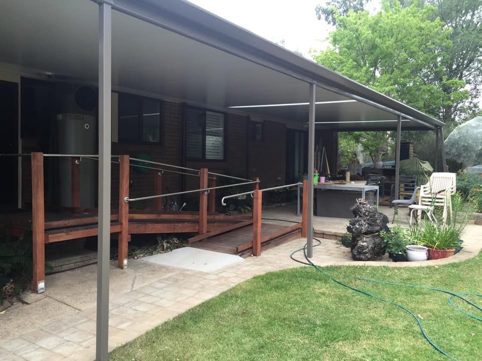 A House with A Covered Porch and A Ramp in The Backyard — P & M Maintenance Building Services in Yass, NSW