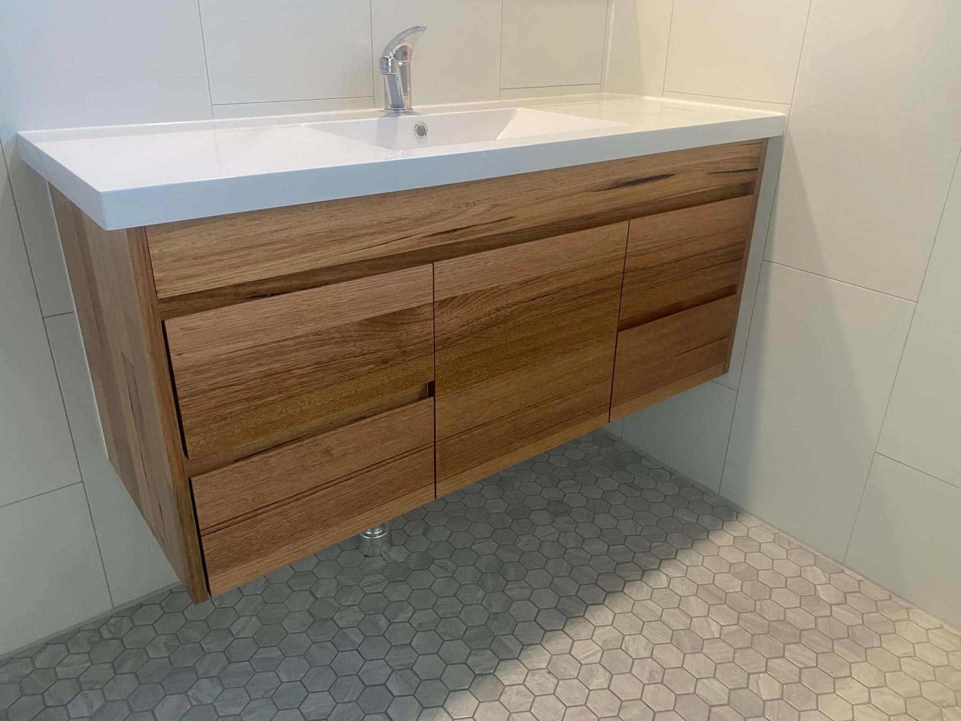 A House With A Pergola And A Wooden Deck In Front Of It — P & M Maintenance Building Services in Yass River, NSW