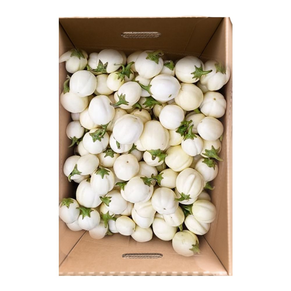 A cardboard box filled with white eggplant with green stems