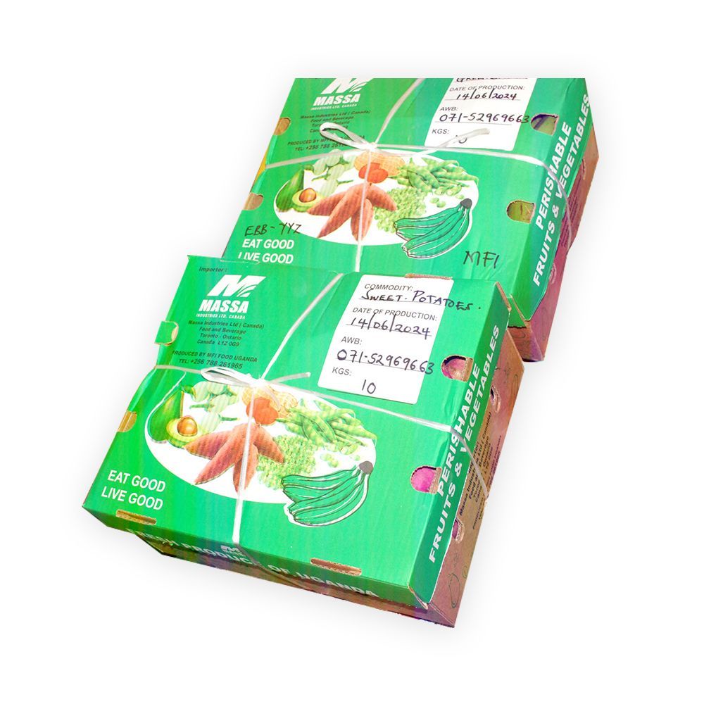 Two boxes of vegetables are stacked on top of each other on a white background.