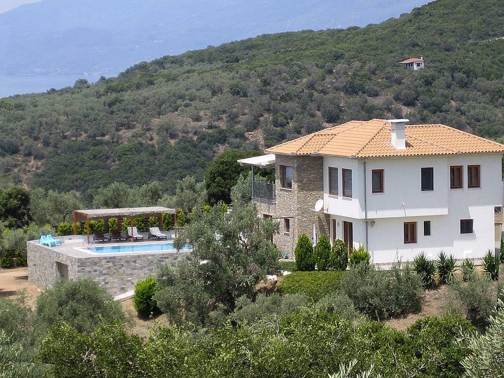 View of villa and pool from east end