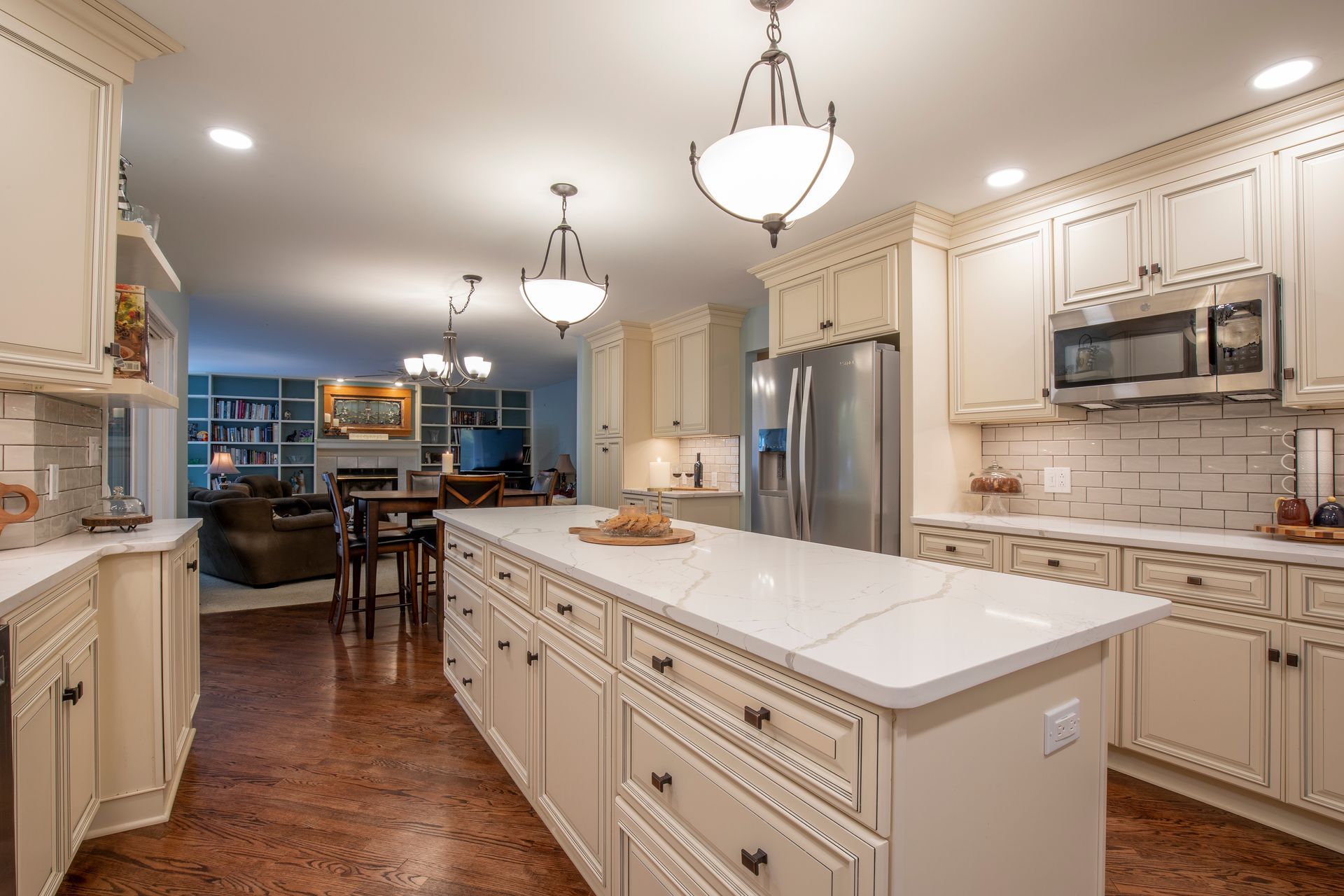 There is a large island in the middle of the kitchen.