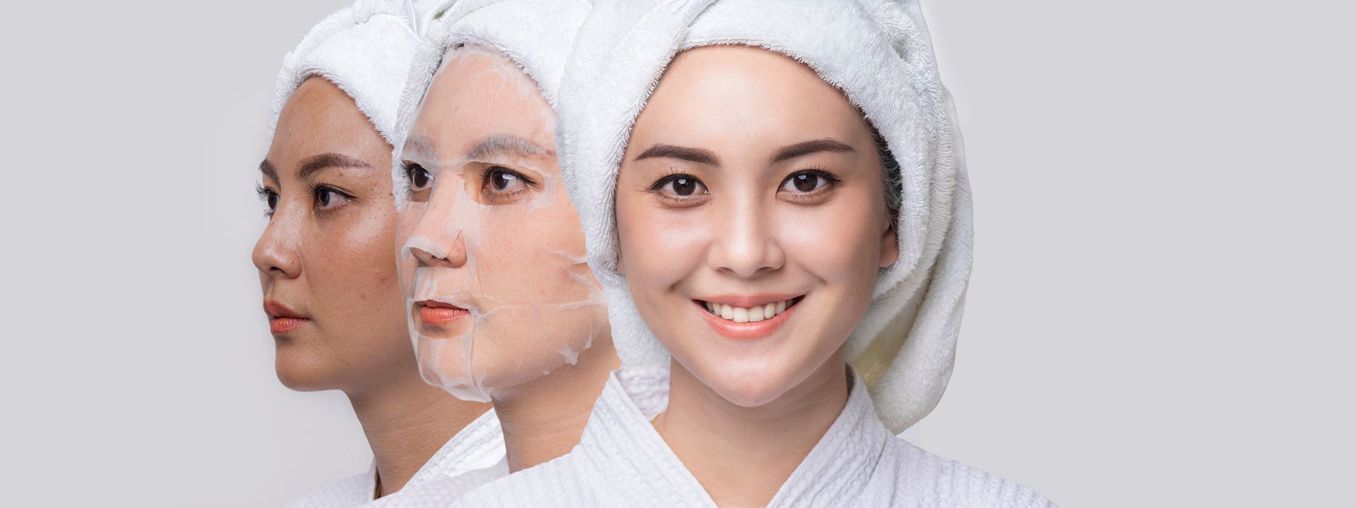 Three women with towels wrapped around their heads and face masks on their faces.