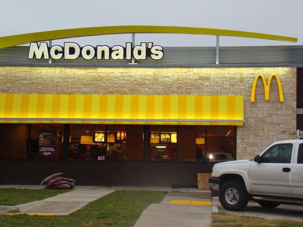 White Vehicle in Front of Fast Food Store — Lubbock, TX — DM Painting