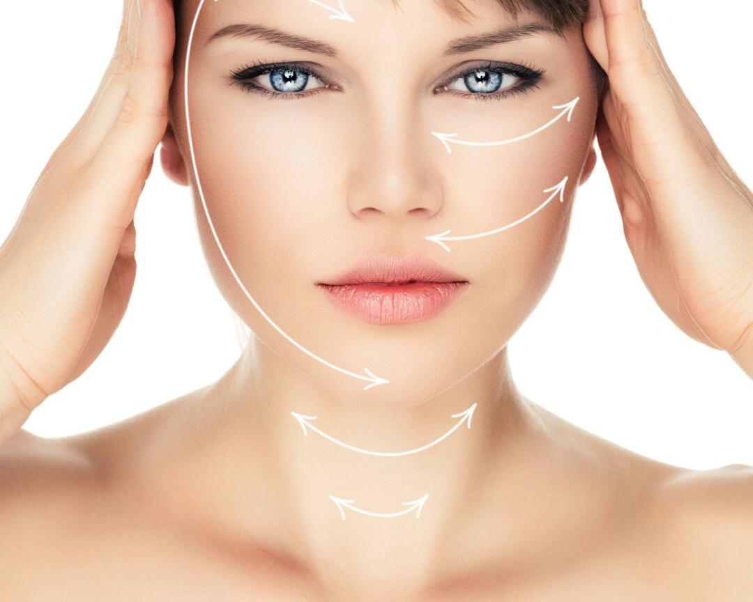 A woman's face with arrows showing the areas affected by a PDO Lunchtime Facelift