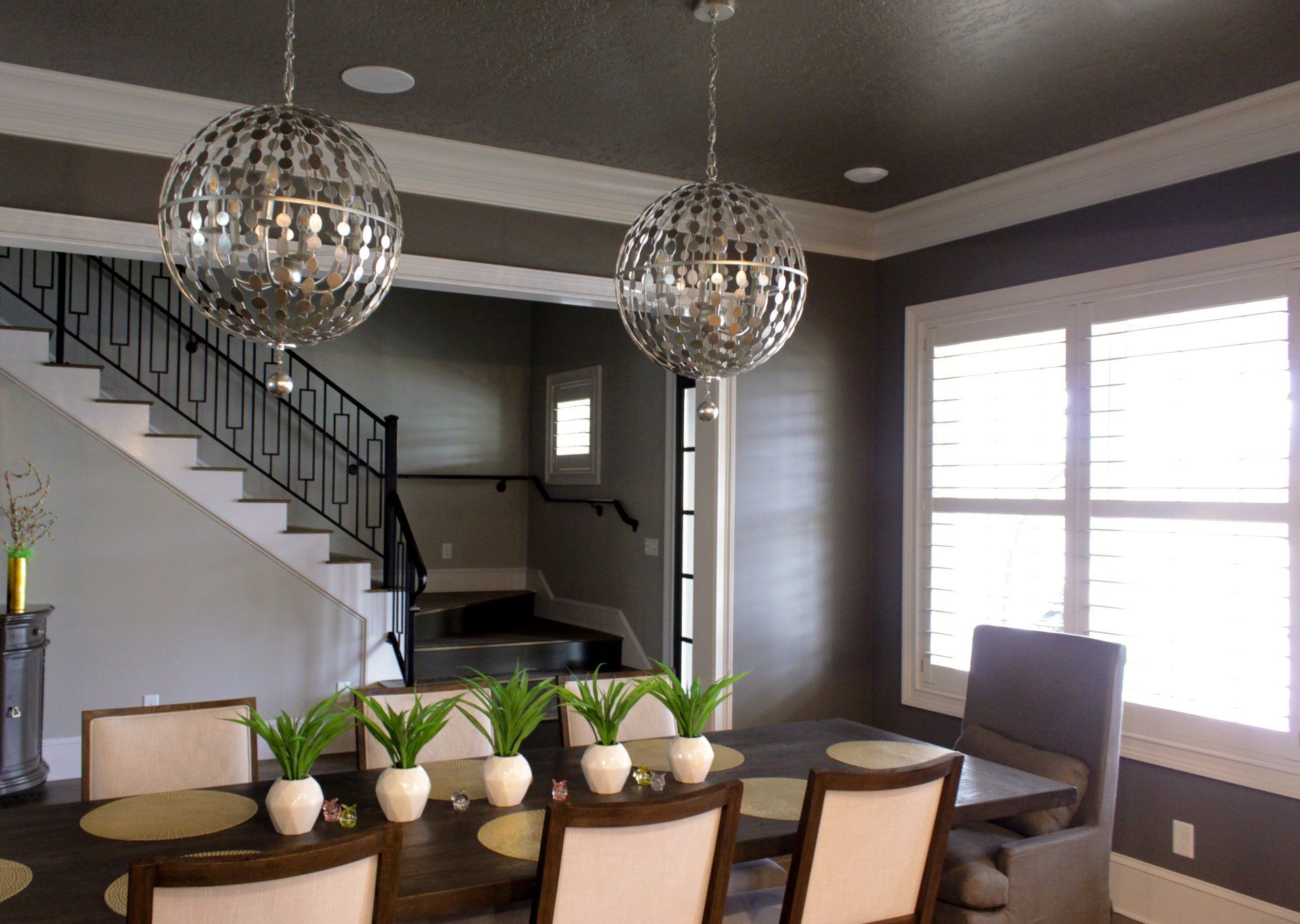 dining room remodel with hanging chandelier