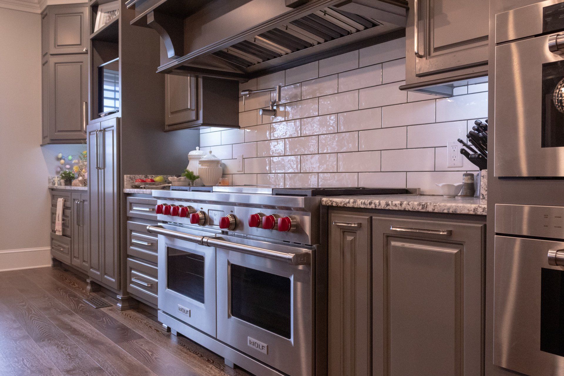 kitchen remodel with appliances, custom cabinets, and backsplash