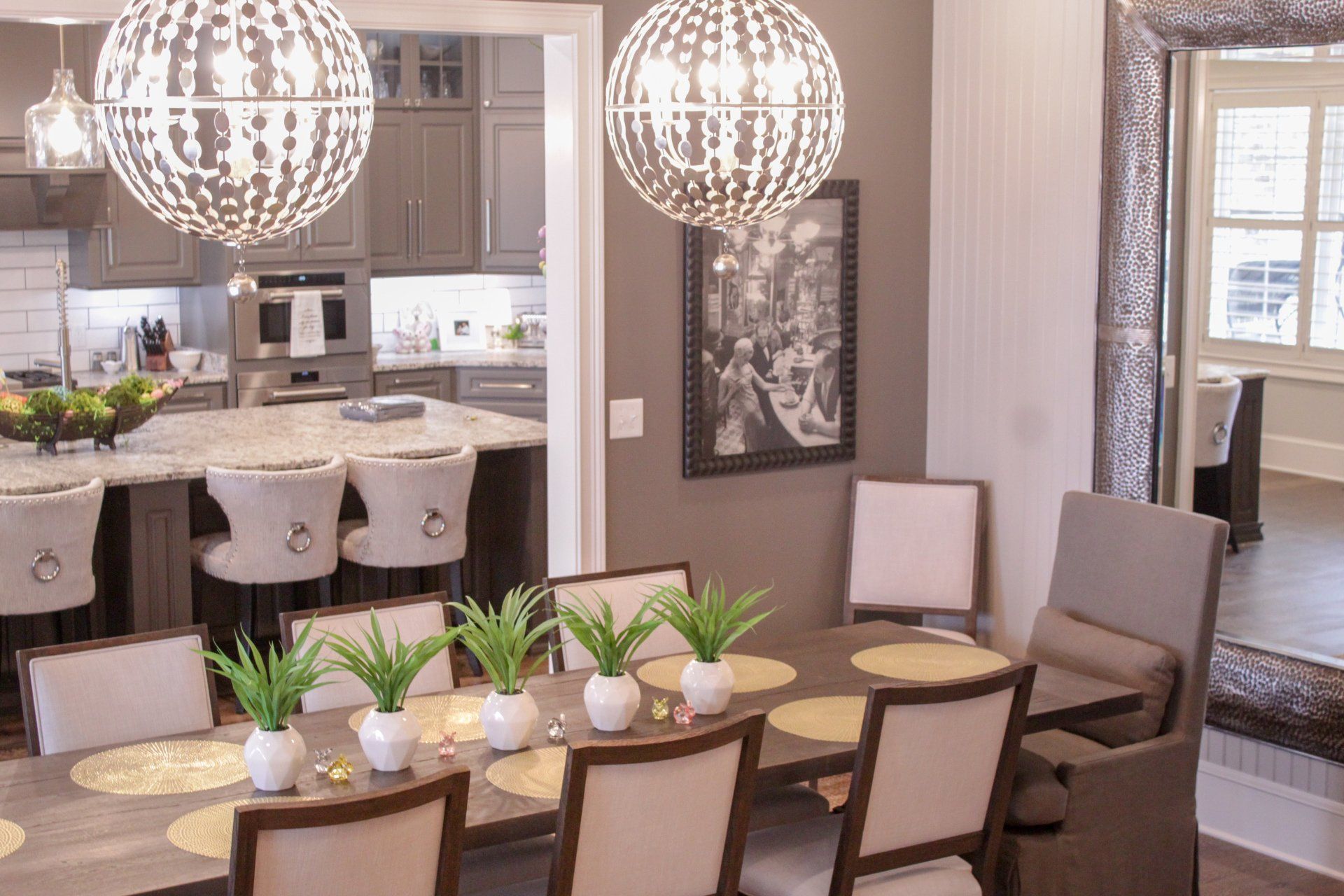 dining room remodel with hanging chandeliers