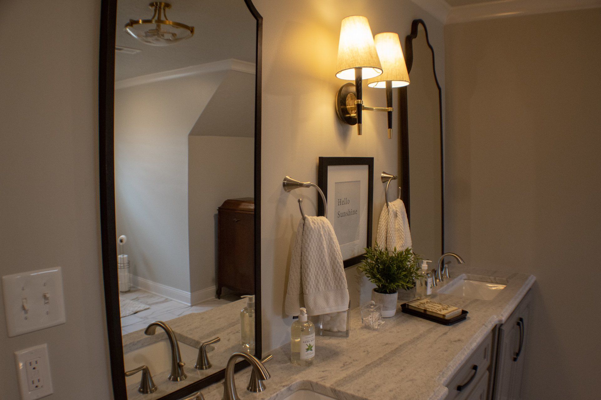 bathroom remodel with new mirror and vanity