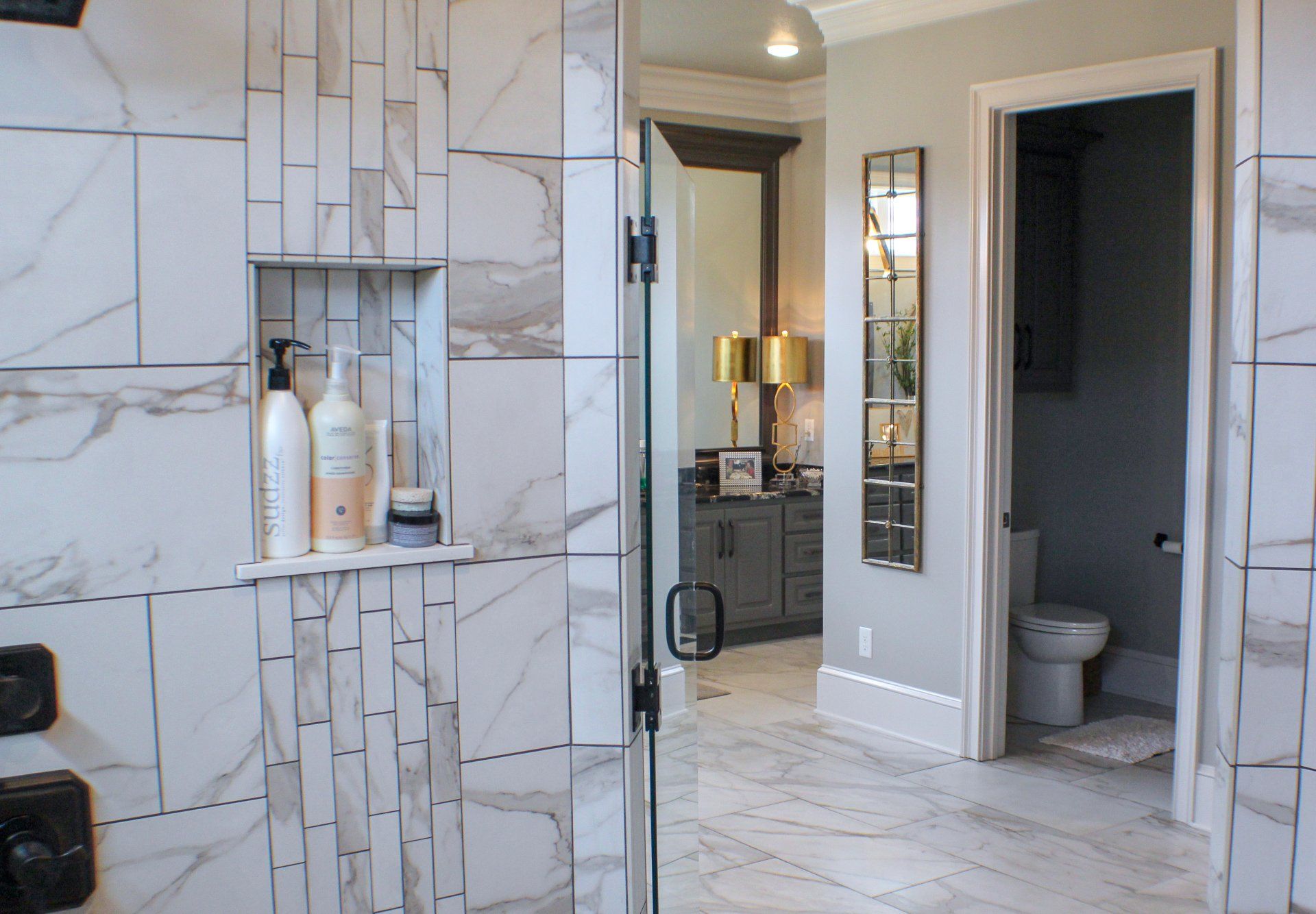 inside walk-in shower looking out into bathroom