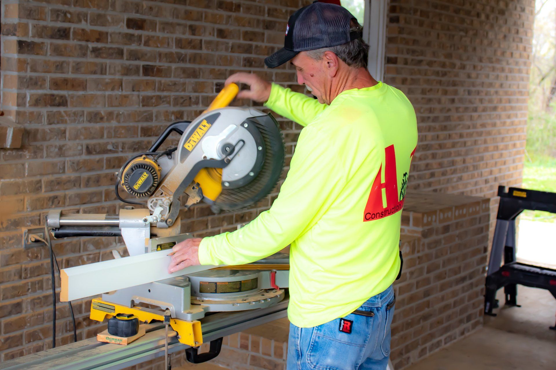 man operating a saw