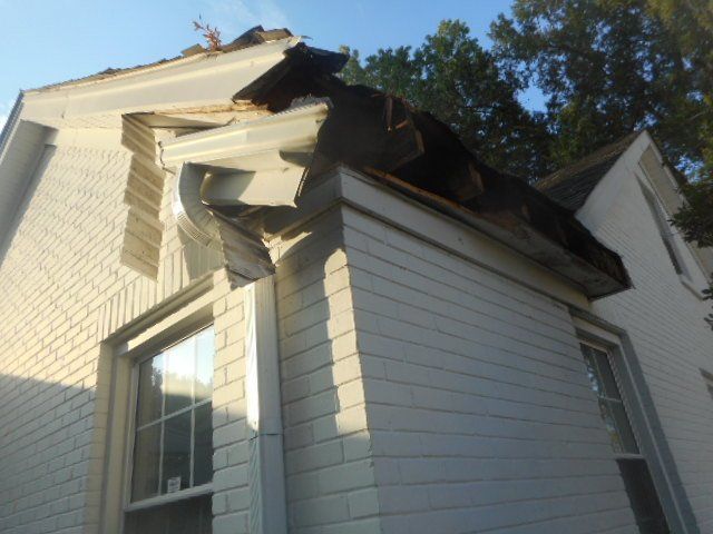 part of roof missing after storm damage
