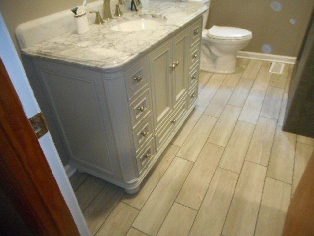 bathroom remodel with new laminate flooring
