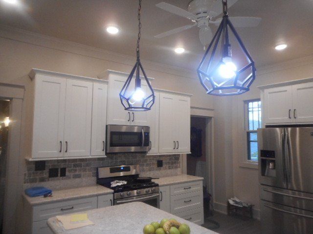 chandelier and recessed lighting installation