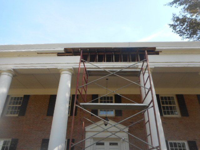 scaffolding preparing to repair roof damage