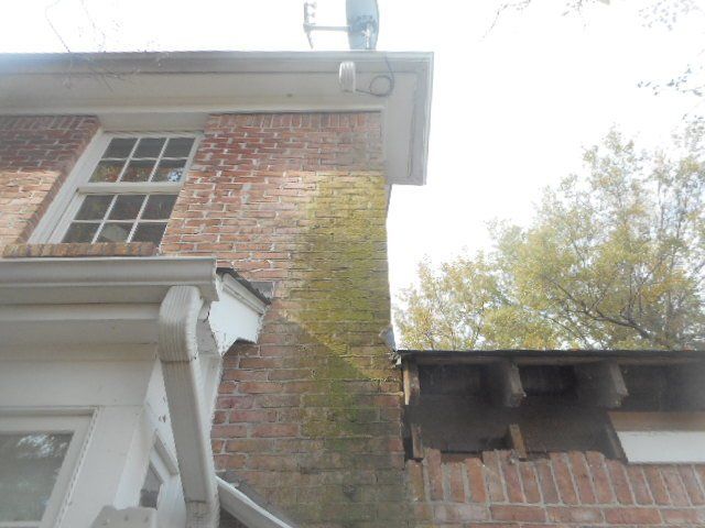 part of roof and exterior wall missing before repair