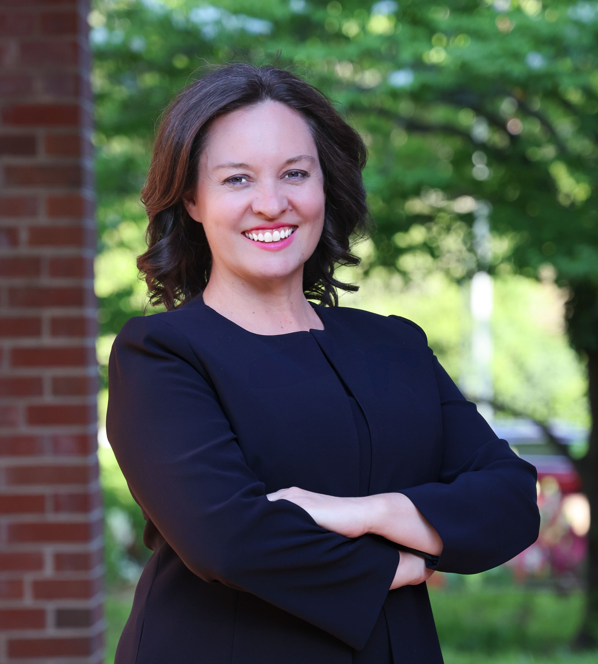 Attorney Alyssa Miller in professional setting, bringing military precision and courtroom experience
