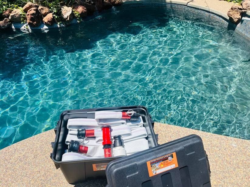 Open toolbox with tools on a pool deck, with a blue pool in the background.