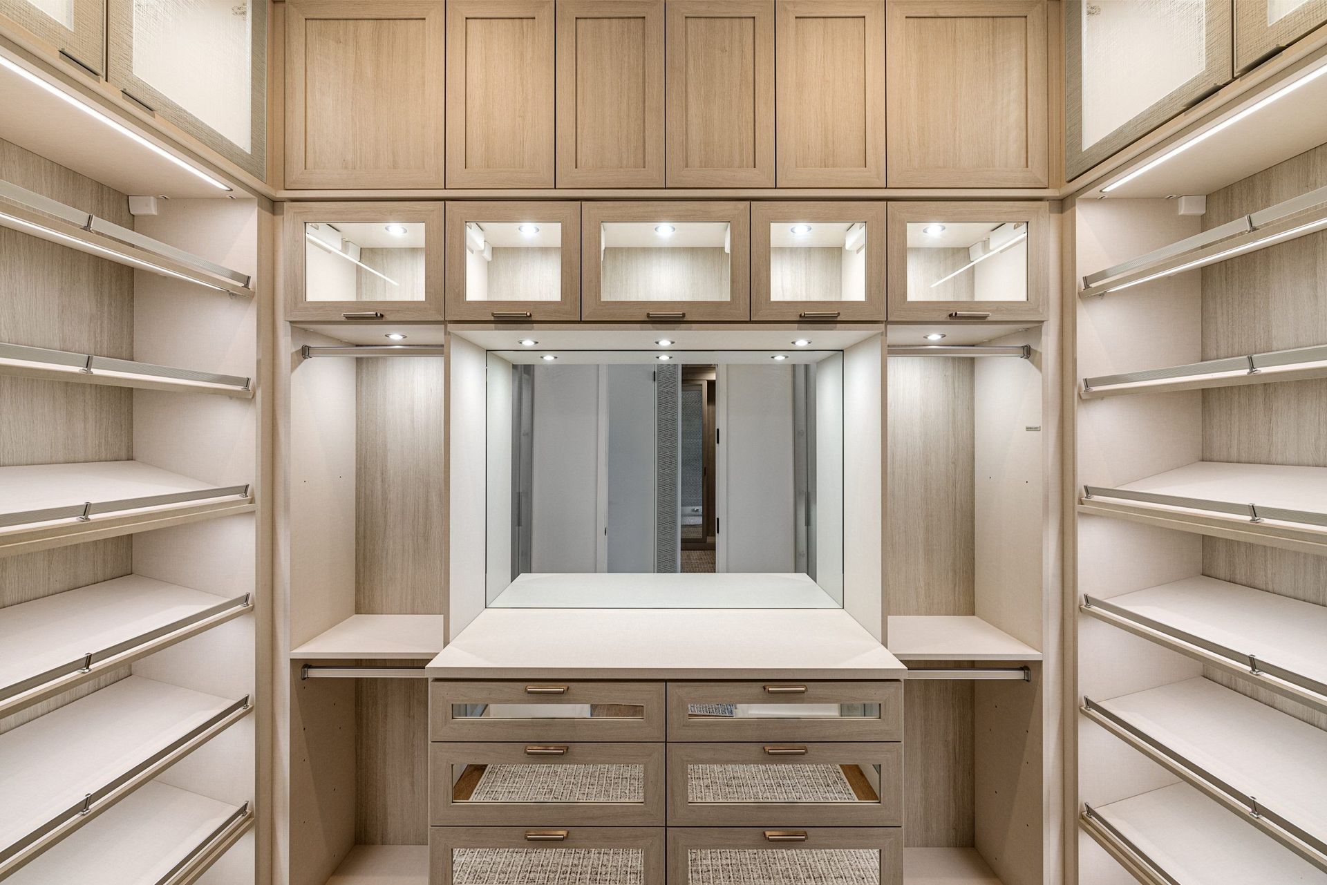 Custom walk-in closet with built-in shelving.