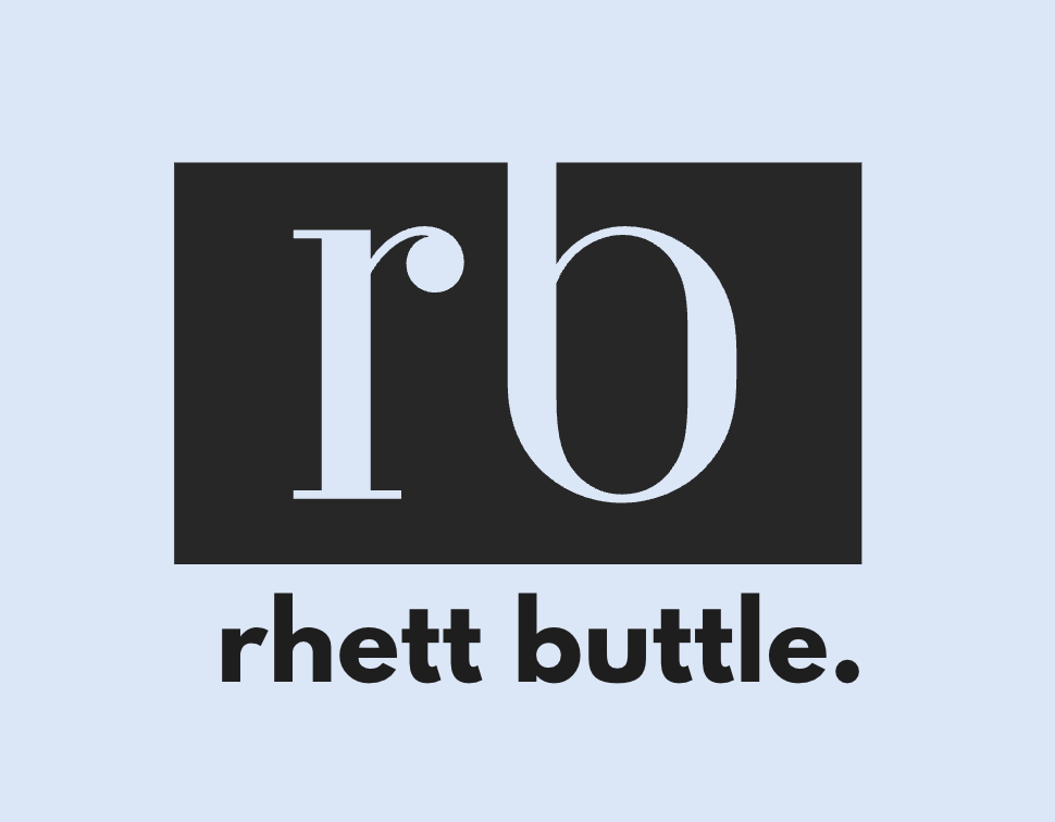 Rhett Buttle text in dark blue.