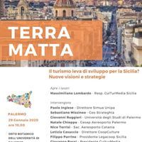 Un manifesto con l'immagine di una città e la scritta terra matta.