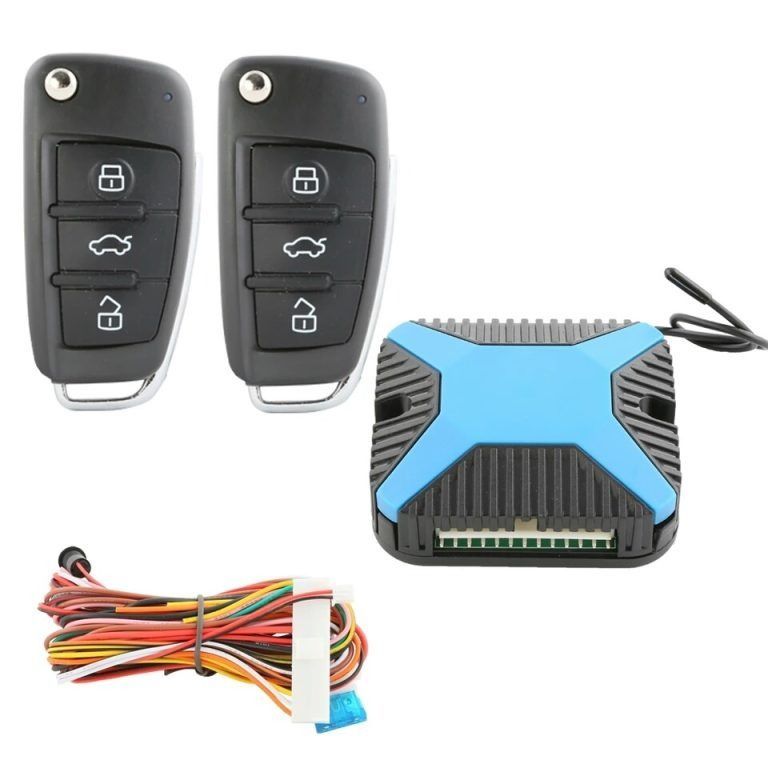 Two black car key fobs and a blue and black control module, plus wiring.