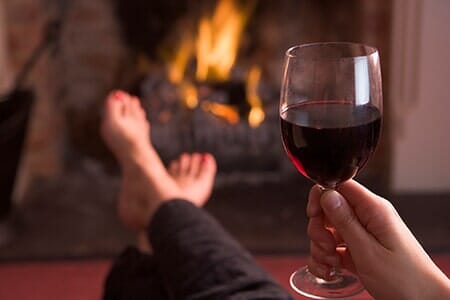 Wood Fireplace — Relaxing in Front of Fireplace in Silverthorne, CO