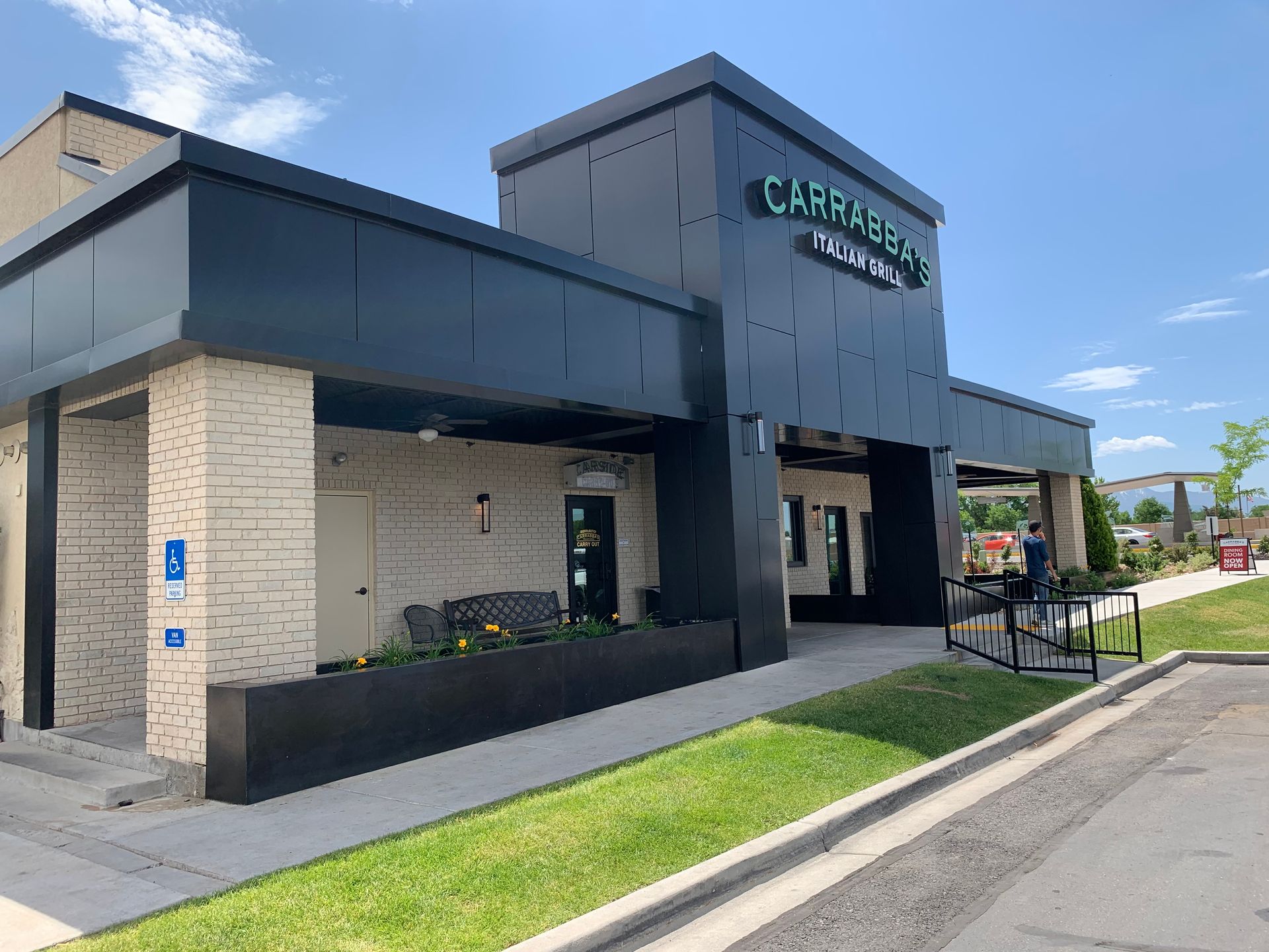 Garage with metal panel roof and doors