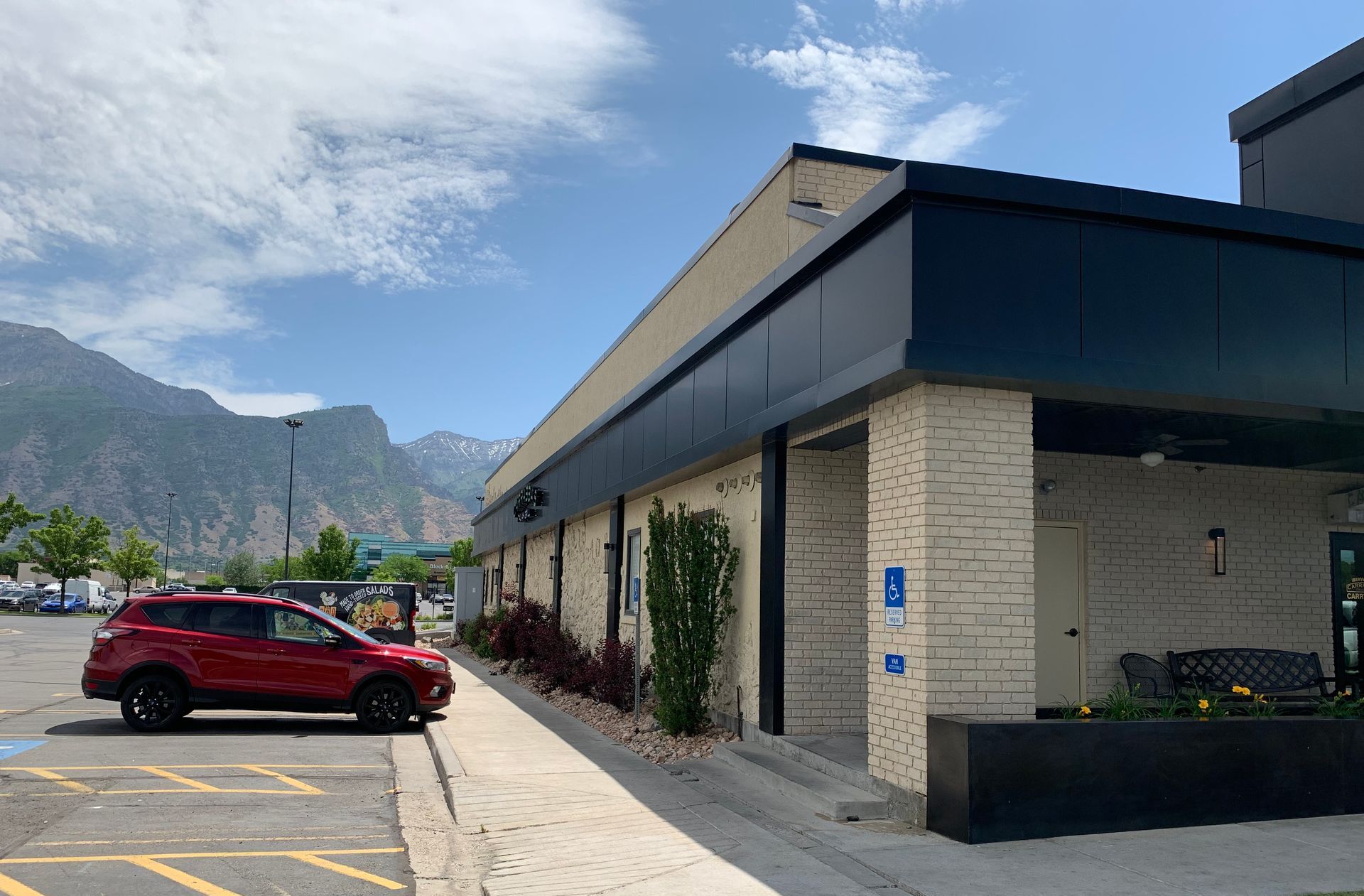 Hime with shingled roof and metal panelled gates