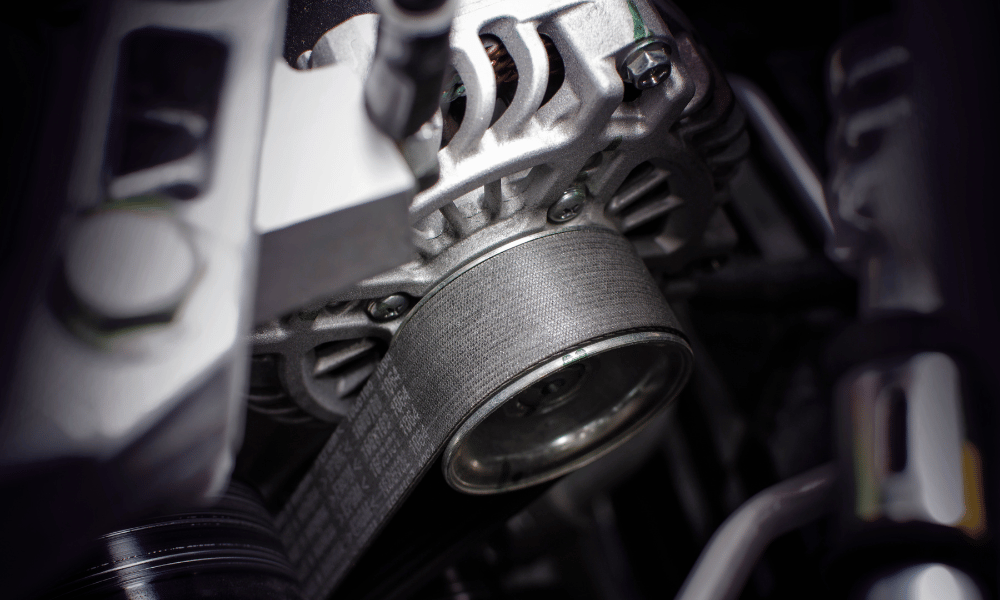 Close-up of engine timing belt and pulley system