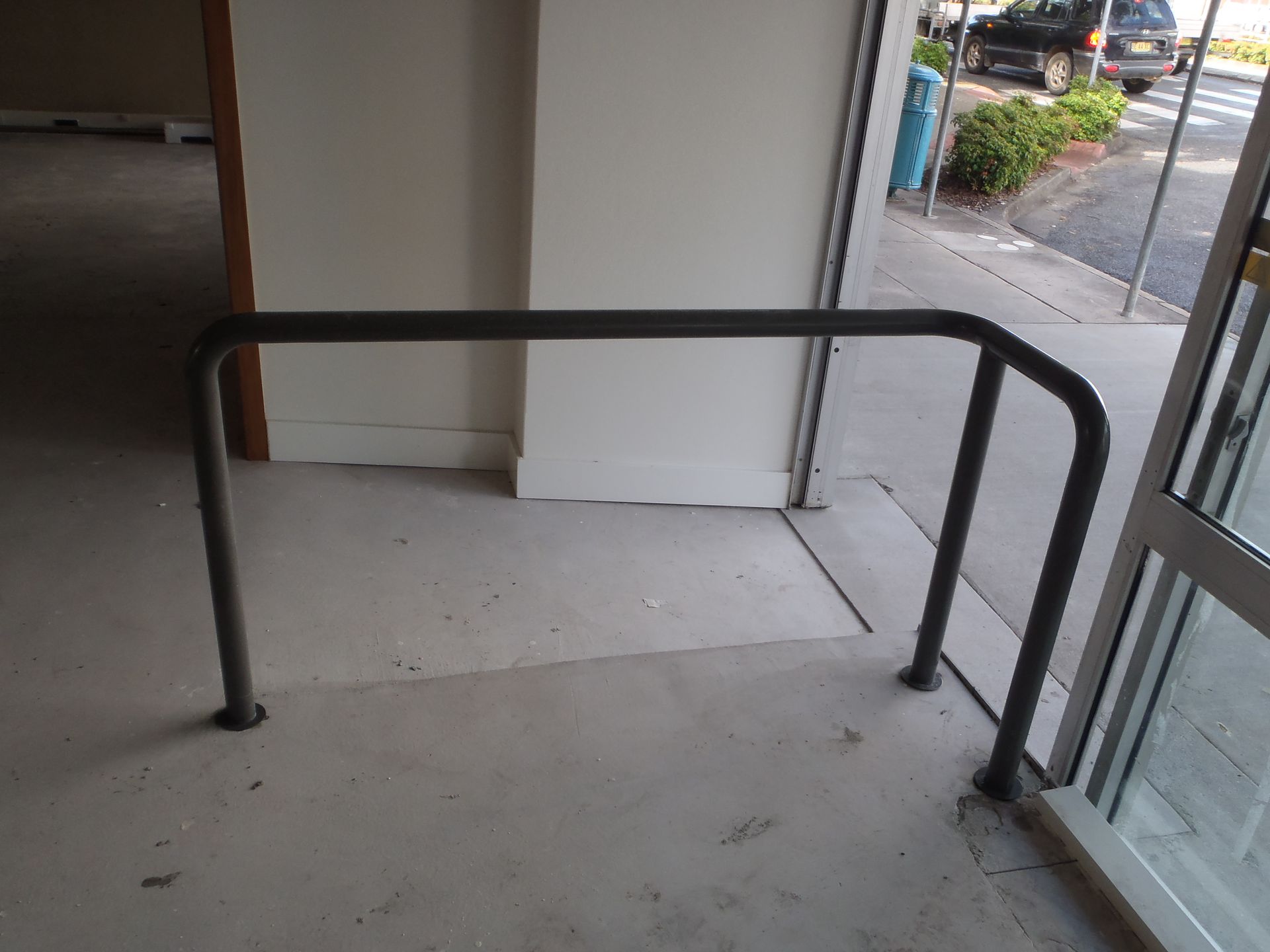 A door with a metal railing in front of it — Fabricator In Coffs Harbour, NSW