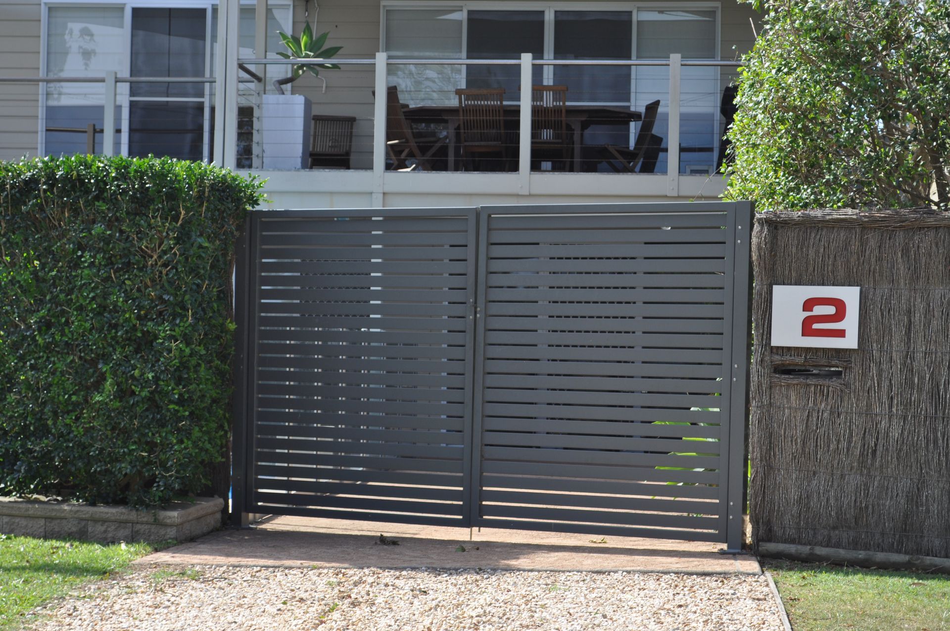 A house with a sign that says 2 on it — Fabricator In Coffs Harbour, NSW