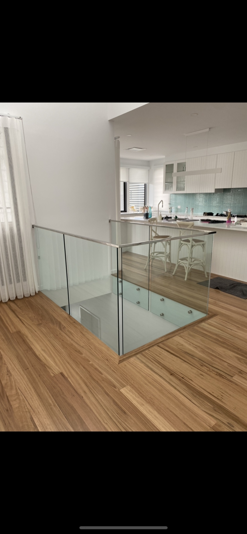 There is a glass railing between the stairs and the kitchen — Fabricator In Coffs Harbour, NSW