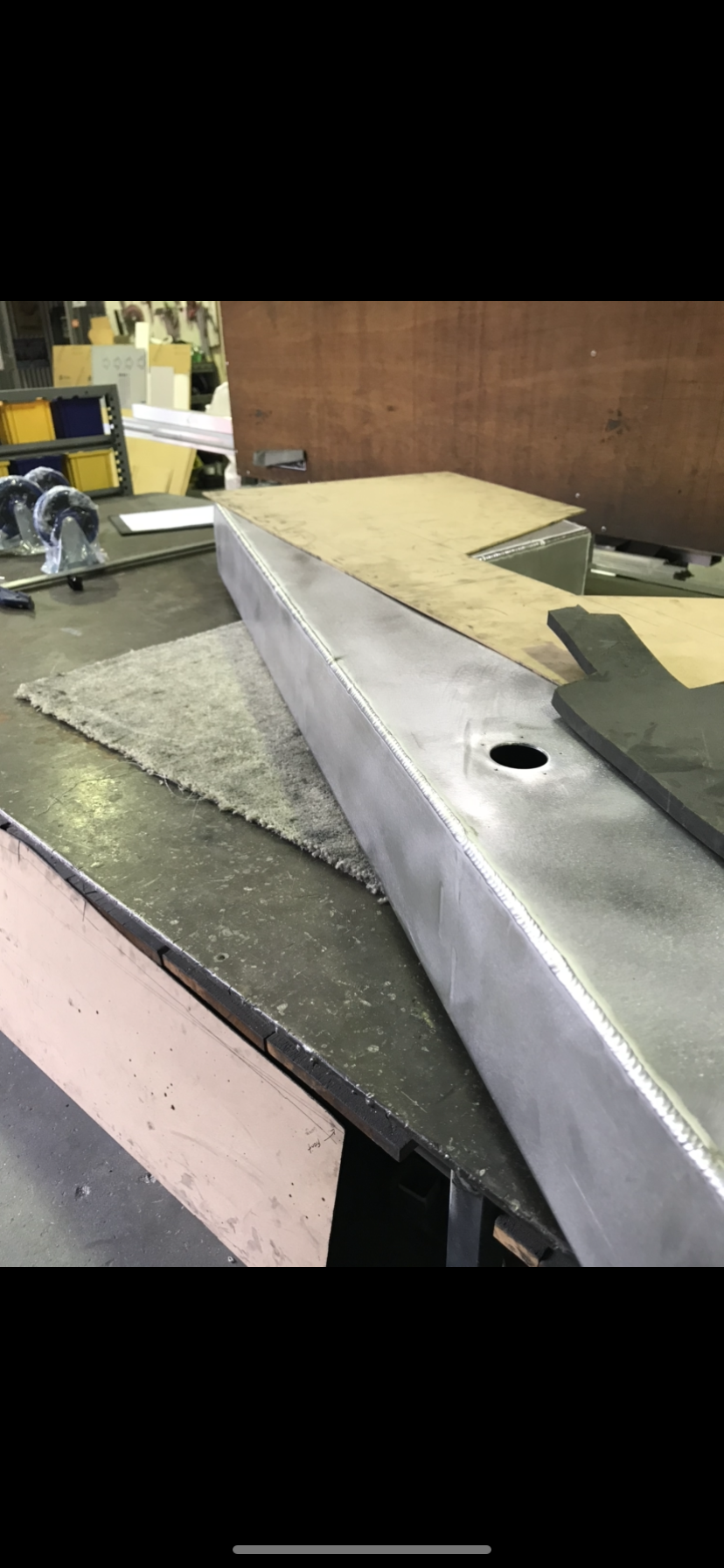 A piece of metal is sitting on top of a table — Fabricator In Coffs Harbour, NSW