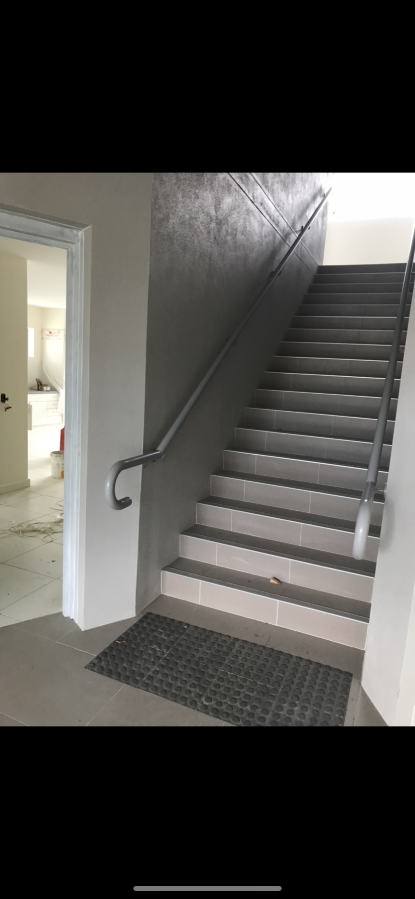 A picture of a staircase with a handrail in a building — Fabricator In Coffs Harbour, NSW