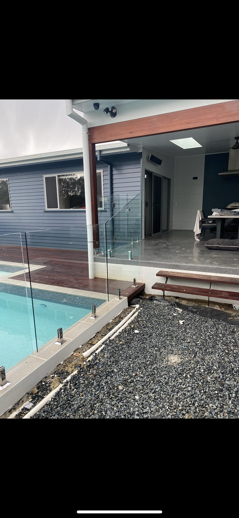There is a swimming pool in the backyard of a house — Fabricator In Coffs Harbour, NSW