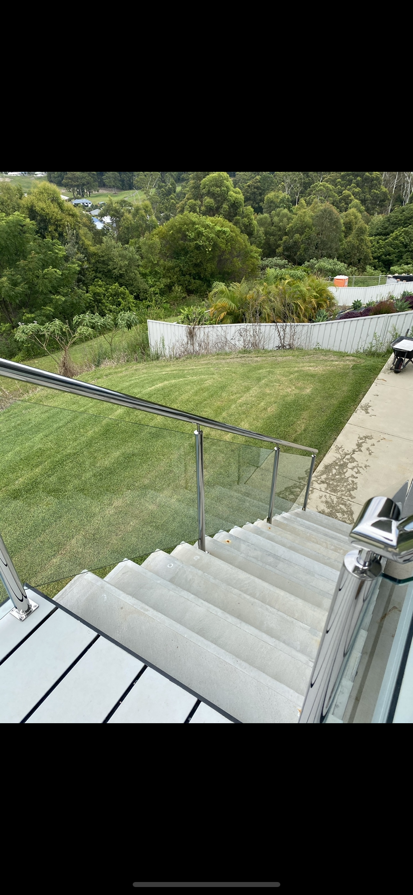A set of stairs leading up to a lush green field — Fabricator In Coffs Harbour, NSW
