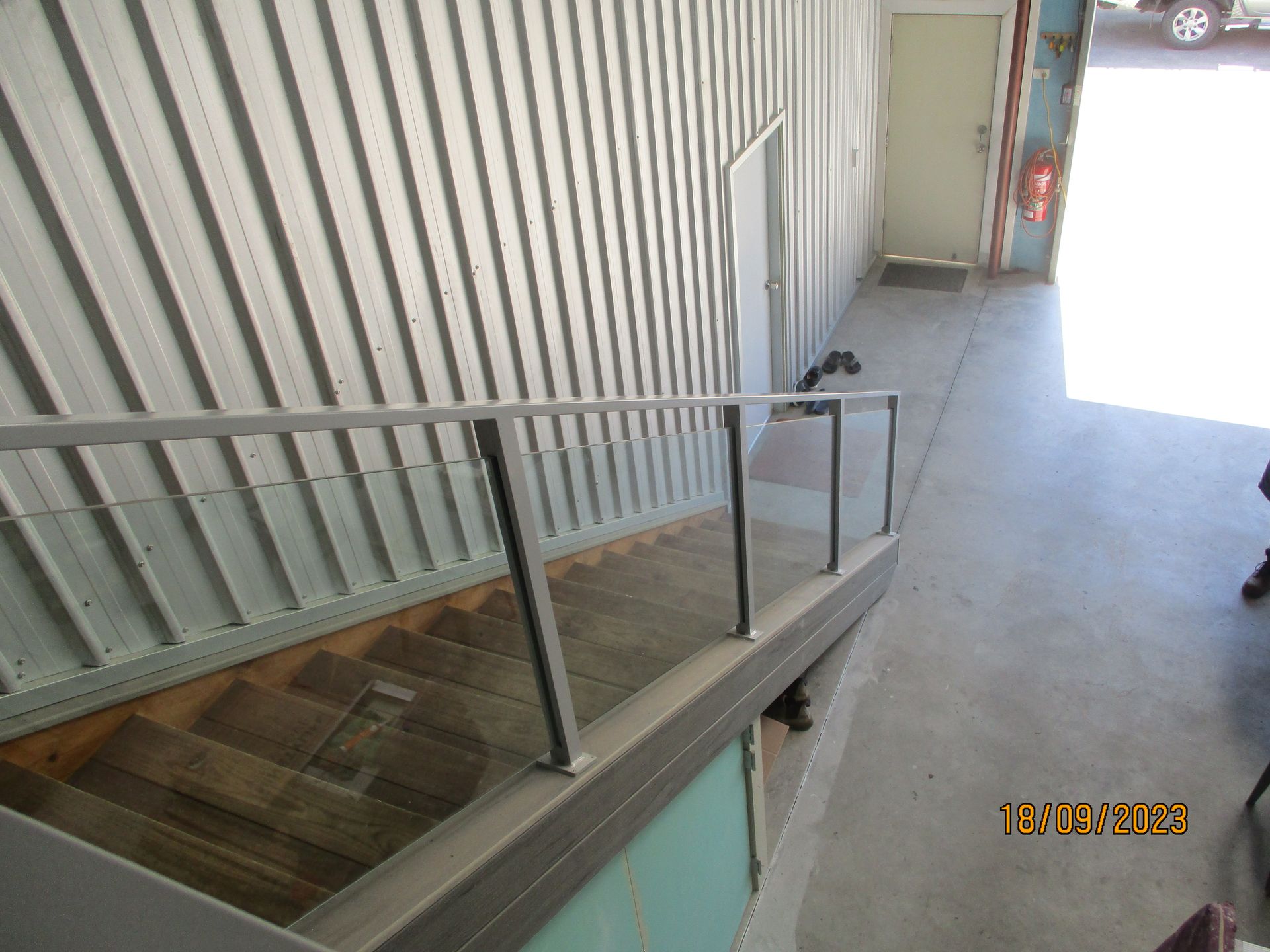 A set of stairs leading up to a building with a railing — Fabricator In Coffs Harbour, NSW