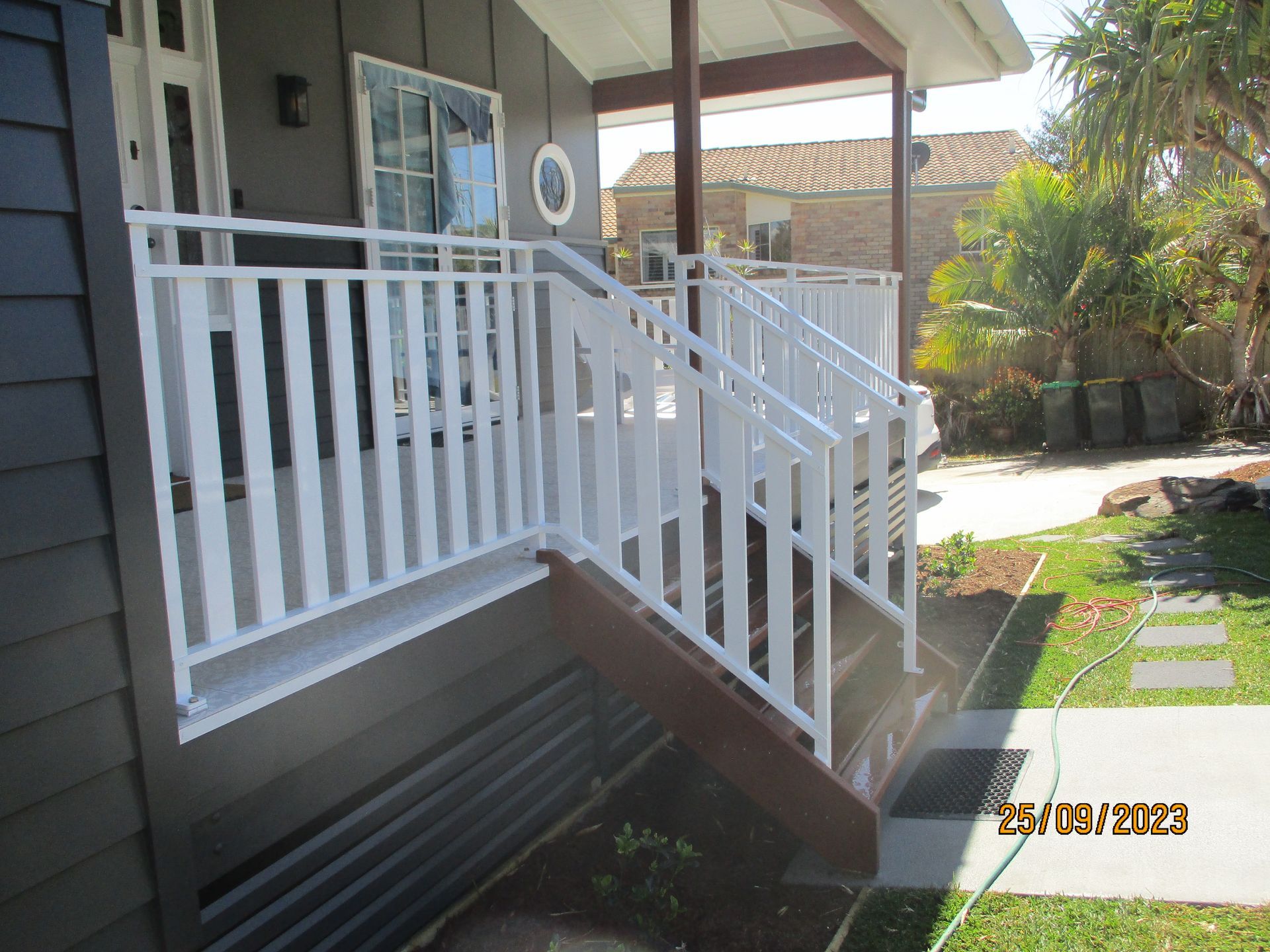 A white railing on the porch of a house — Fabricator In Coffs Harbour, NSW