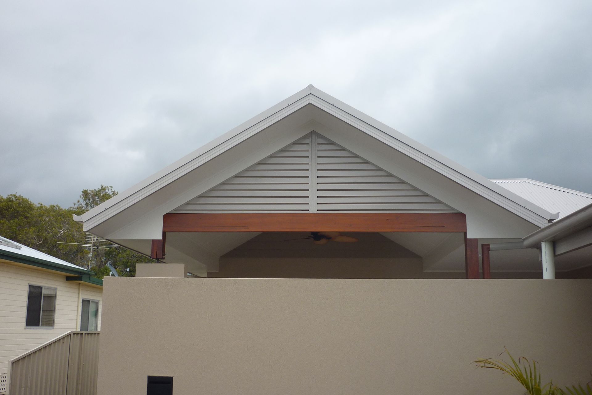 A house with a white roof and a wooden porch — Fabricator In Coffs Harbour, NSW
