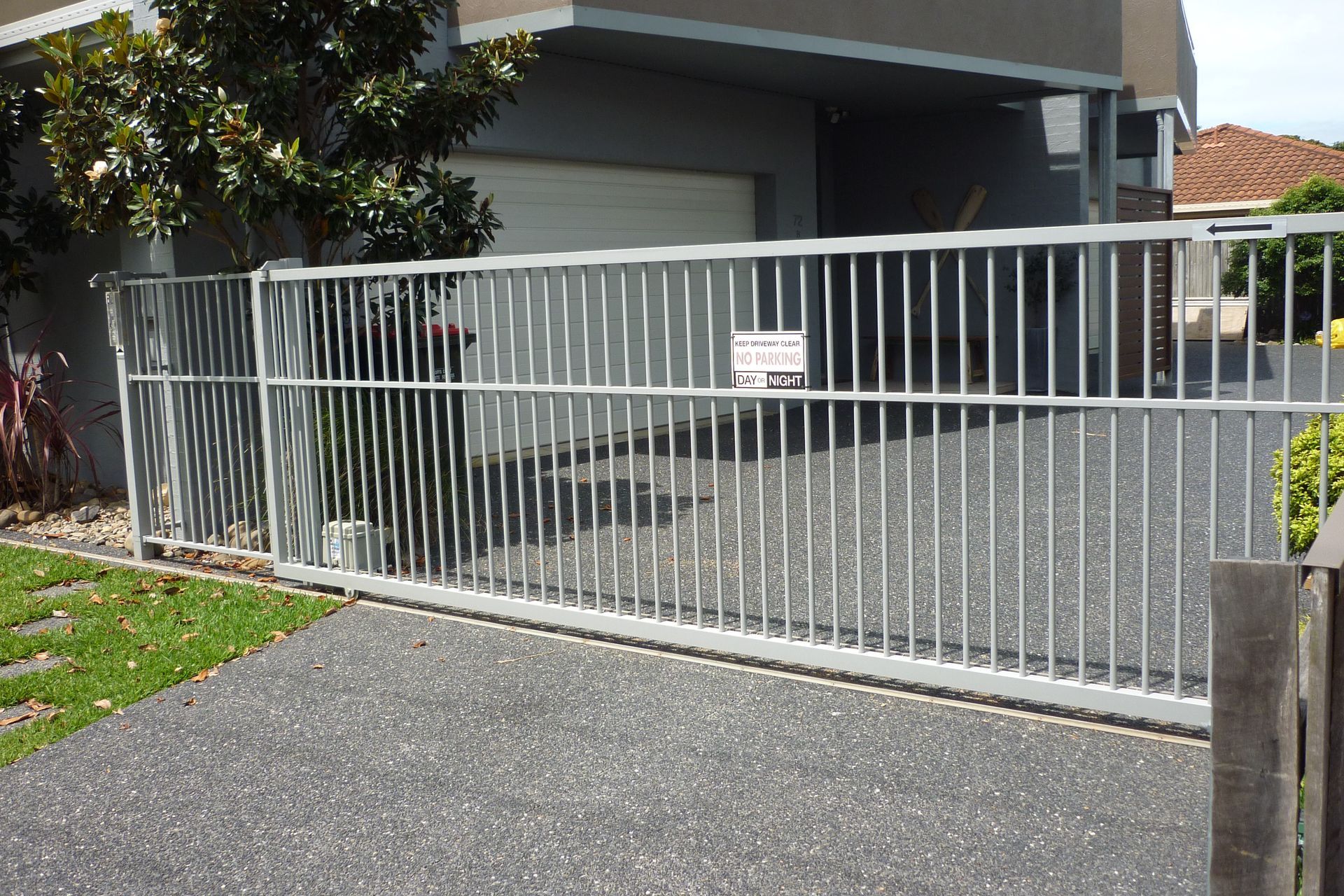A fence with a sign on it that says no parking — Fabricator In Coffs Harbour, NSW