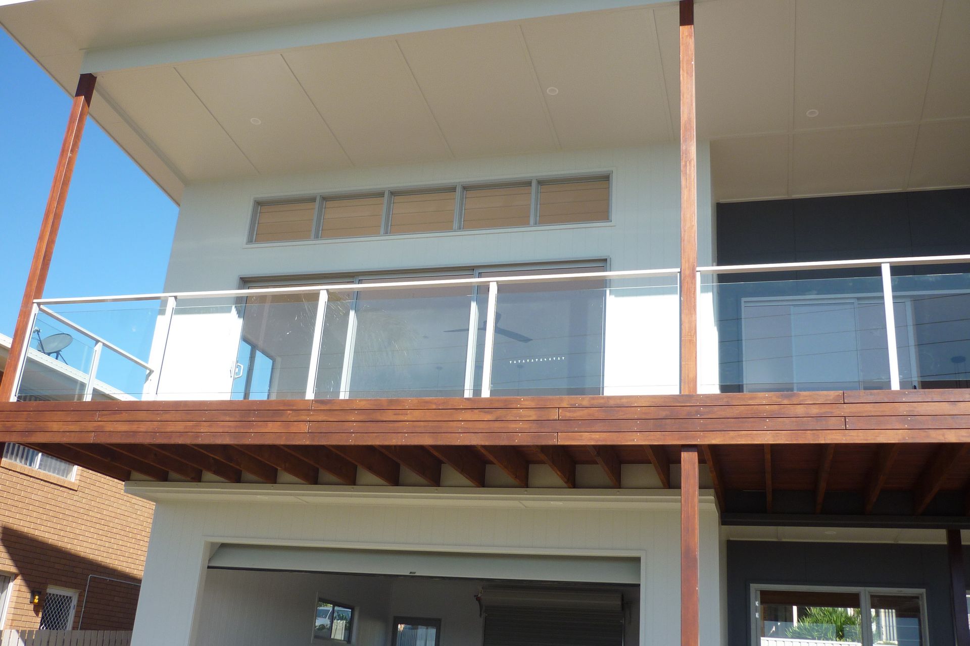 A house with a balcony and a stainless steel railing — Fabricator In Coffs Harbour, NSW