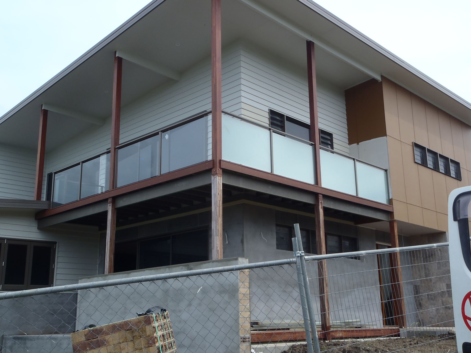 A building under construction with a fence around it — Fabricator In Coffs Harbour, NSW