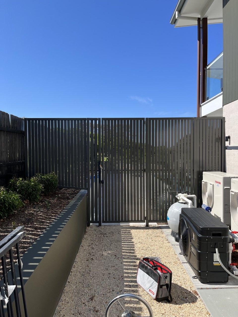 There is a fence in the backyard of a house — Fabricator In Coffs Harbour, NSW