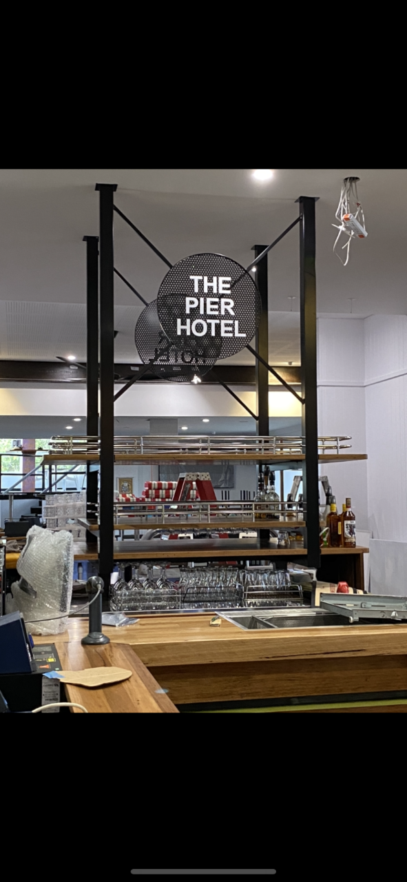 A restaurant with a sign that says the pier hotel on it — Fabricator In Coffs Harbour, NSW