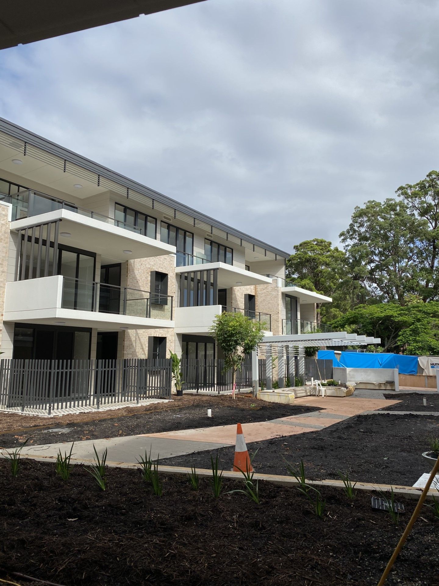 A large building with a lot of windows and balconies — Fabricator In Coffs Harbour, NSW